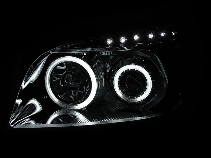 ANZO projector headlights with halo design for 2006-2008 Toyota Rav4, featuring a sleek black finish and clear lens.