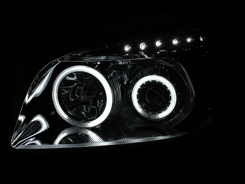 ANZO projector headlights with halo design for 2006-2008 Toyota Rav4, featuring a sleek black finish and clear lens.
