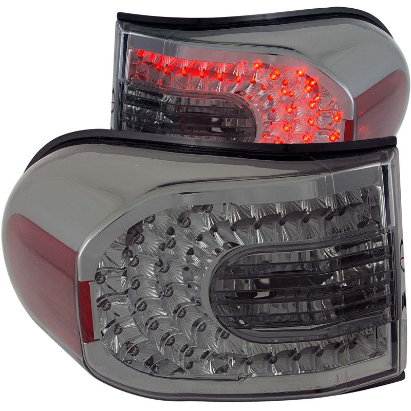 ANZO LED taillights for 2007-2010 Toyota FJ Cruiser with smoke lens, showcasing modern design and enhanced visibility.