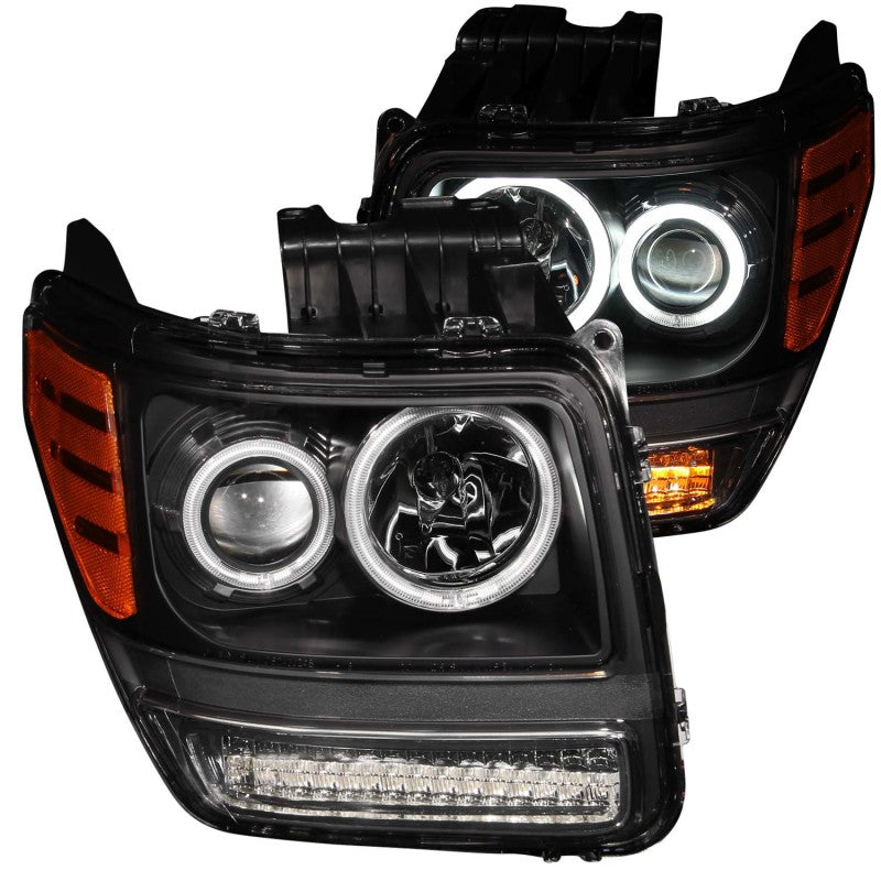 ANZO 2007-2012 Dodge Nitro Projector Headlights with Halo Black CCFL, showcasing sleek black housing and clear lens design.