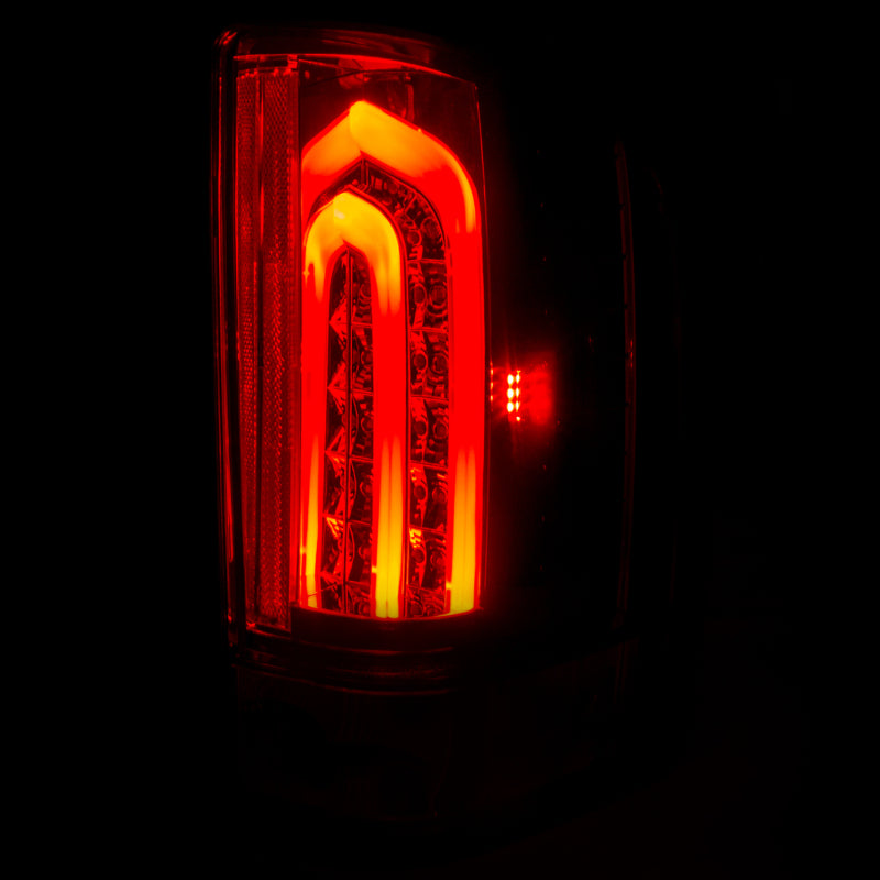 ANZO LED taillights for 2007-2013 Chevrolet Silverado 1500 with smoke lens, showcasing modern design and bright LED illumination.