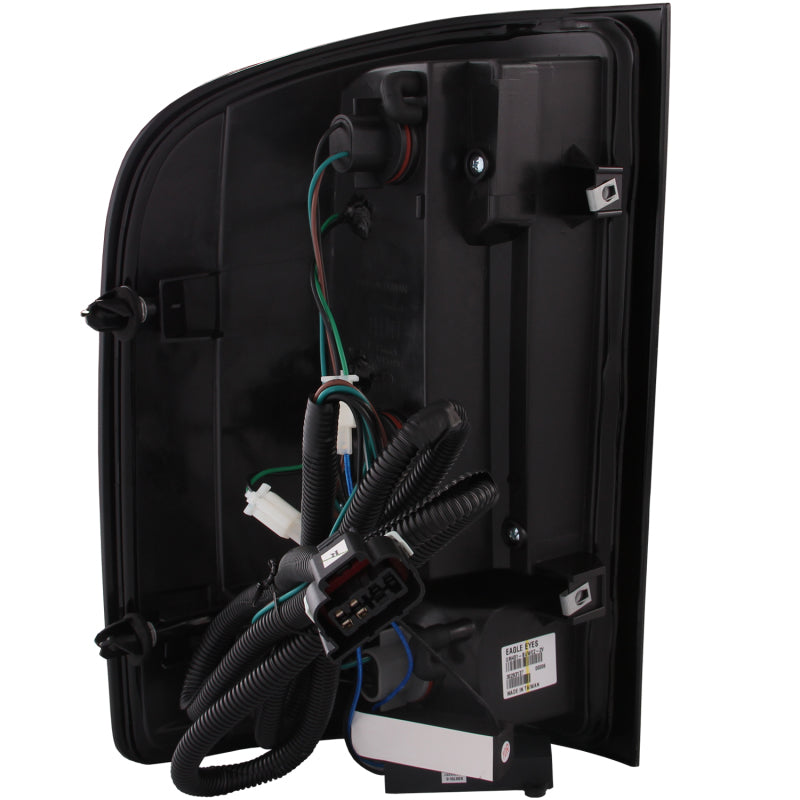 ANZO LED taillights for 2007-2013 Chevrolet Silverado 1500 with smoke lens, showcasing modern design and bright LED illumination.