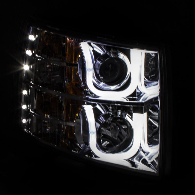 ANZO projector headlights for 2007-2013 Chevrolet Silverado 1500 with clear lens and chrome housing featuring a U-Bar design.