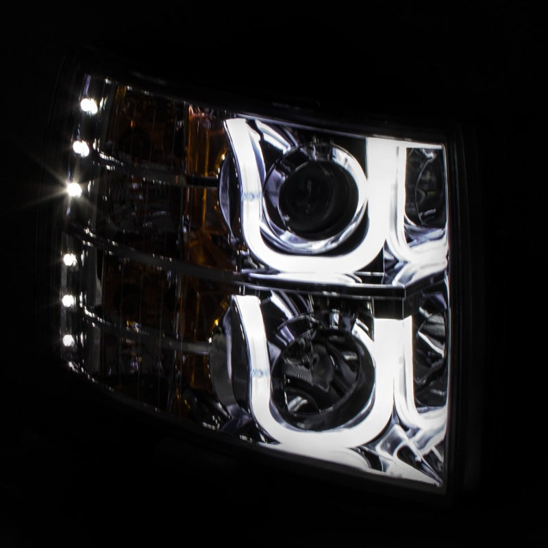 ANZO projector headlights for 2007-2013 Chevrolet Silverado 1500 with clear lens and chrome housing featuring a U-Bar design.