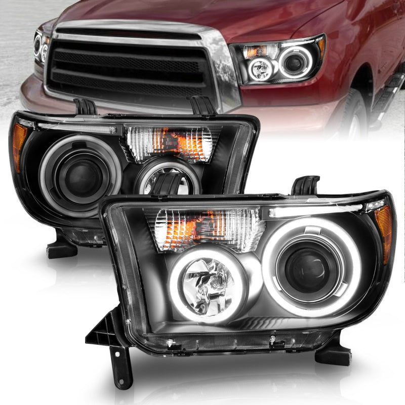 ANZO 2007-2013 Toyota Tundra Projector Headlights with Halo in black housing, showcasing clear lens and stylish design.