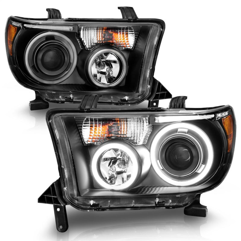 ANZO 2007-2013 Toyota Tundra Projector Headlights with Halo in black housing, showcasing clear lens and stylish design.