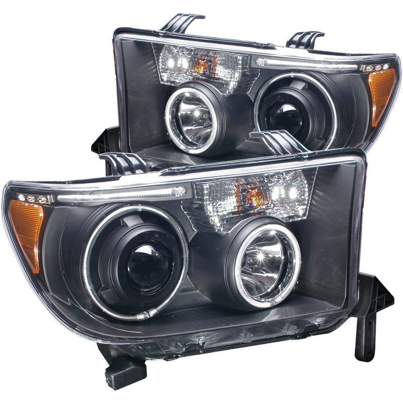 ANZO 2007-2013 Toyota Tundra Projector Headlights with Halo in black housing, showcasing clear lens and stylish design.