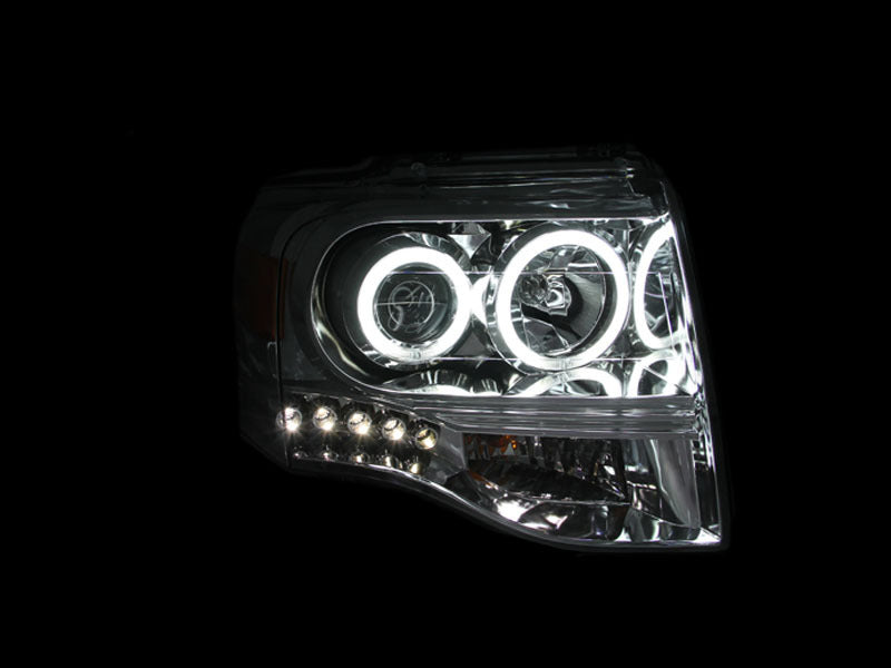 ANZO 2007-2014 Ford Expedition projector headlights with chrome housing and clear lens, featuring halo design.