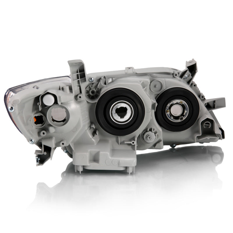 ANZO 2007-2009 Toyota Camry Projector Headlight set featuring clear lens and chrome housing.