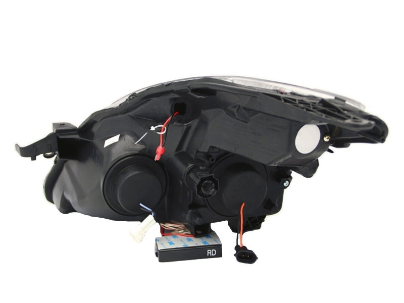 ANZO projector headlights for 2008-2009 Nissan Altima, featuring clear lens and black housing with halo design.