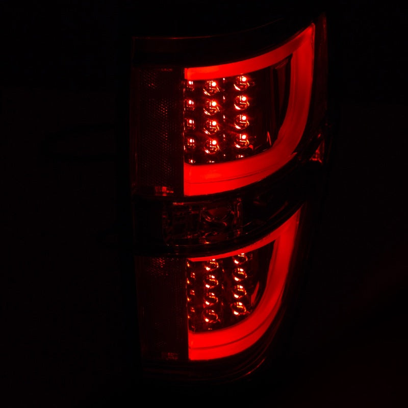 ANZO LED Taillights for 2009-2013 Ford F-150 in smoke finish, showcasing modern design and superior lighting.