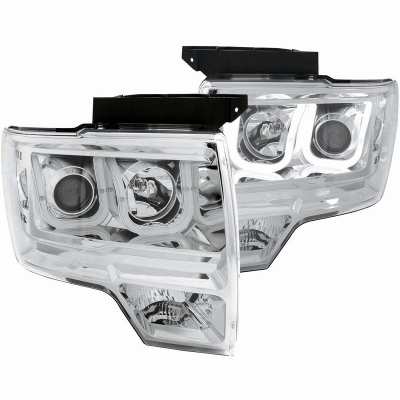 ANZO 2009-2014 Ford F-150 projector headlights with U-Bar chrome housing, showcasing clear lens and modern design.