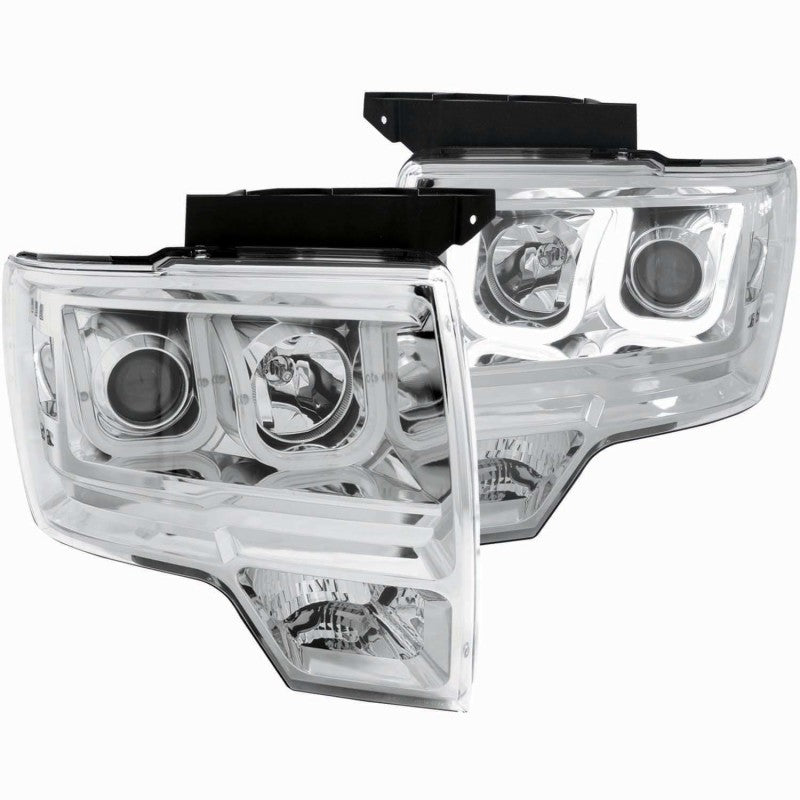 ANZO 2009-2014 Ford F-150 projector headlights with U-Bar chrome housing, showcasing clear lens and modern design.