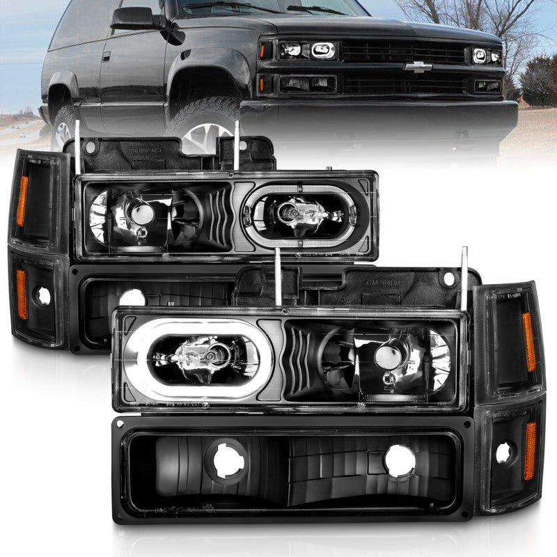 ANZO 88-98 Chevrolet C1500 Crystal Headlights with black housing, showcasing clear lenses and modern design.