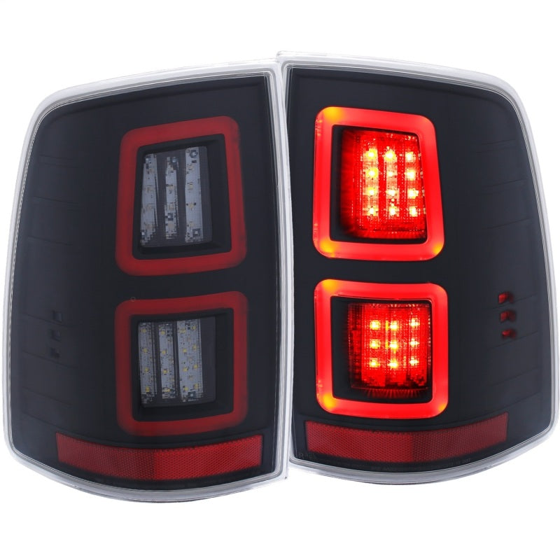ANZO LED Black Taillights for 2013-2017 Dodge Ram 1500/2500/3500, featuring a sleek red/smoke lens design.