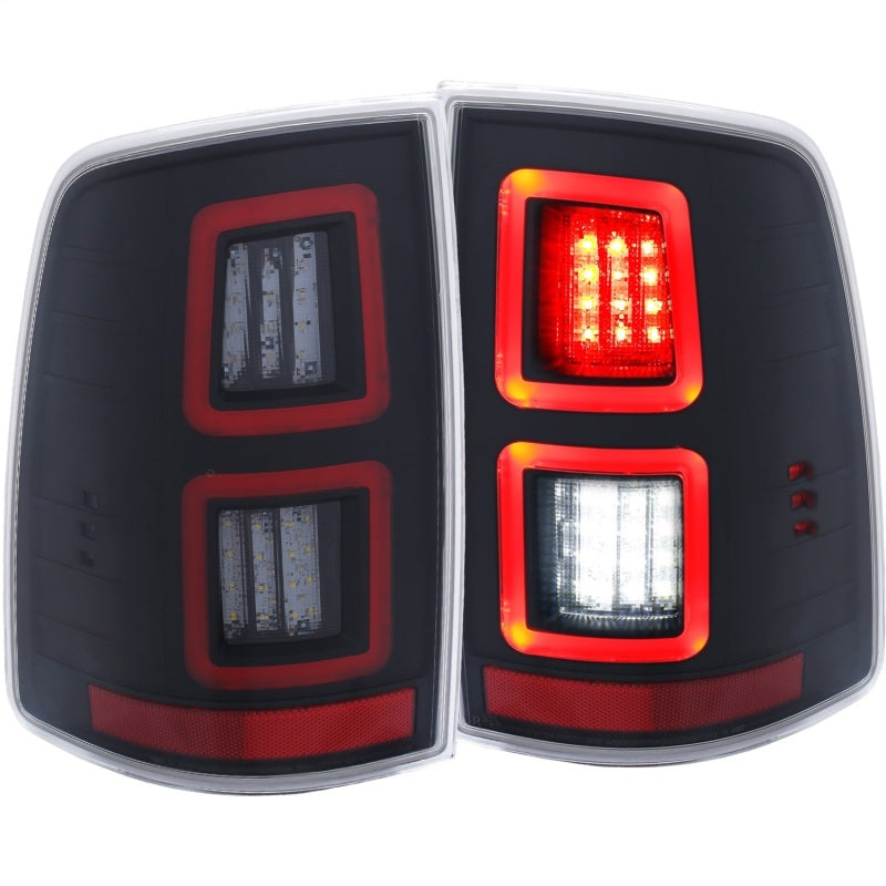 ANZO LED Black Taillights for 2013-2017 Dodge Ram 1500/2500/3500, featuring a sleek red/smoke lens design.