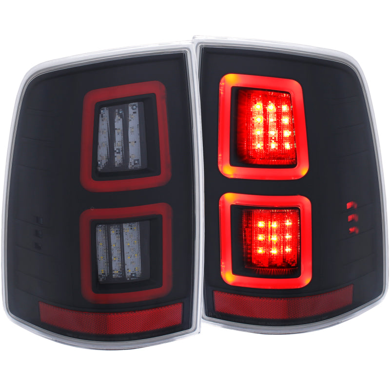ANZO LED Black Taillights for 2013-2017 Dodge Ram 1500/2500/3500, featuring a sleek red/smoke lens design.