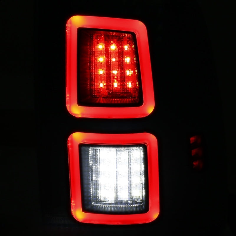 ANZO LED Black Taillights for 2013-2017 Dodge Ram 1500/2500/3500, featuring a sleek red/smoke lens design.