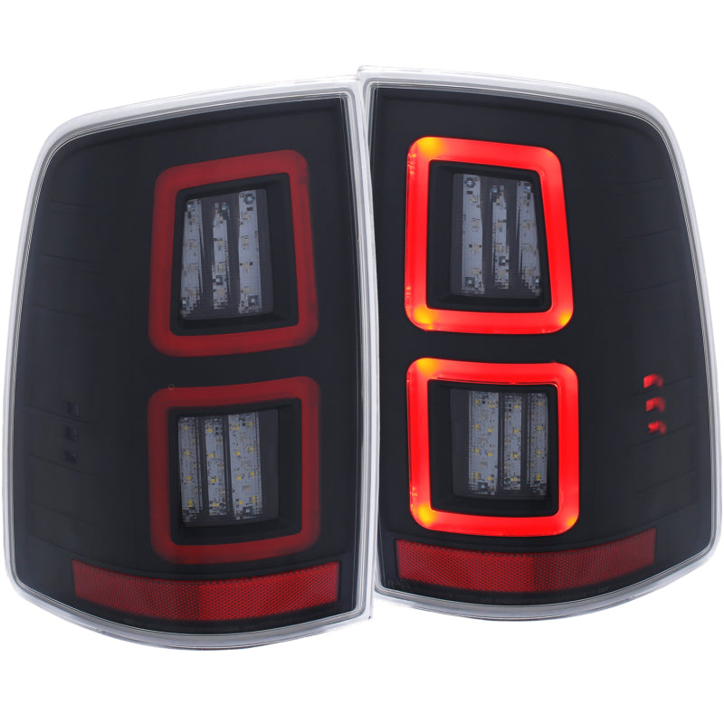 ANZO LED Black Taillights for 2013-2017 Dodge Ram 1500/2500/3500, featuring a sleek red/smoke lens design.