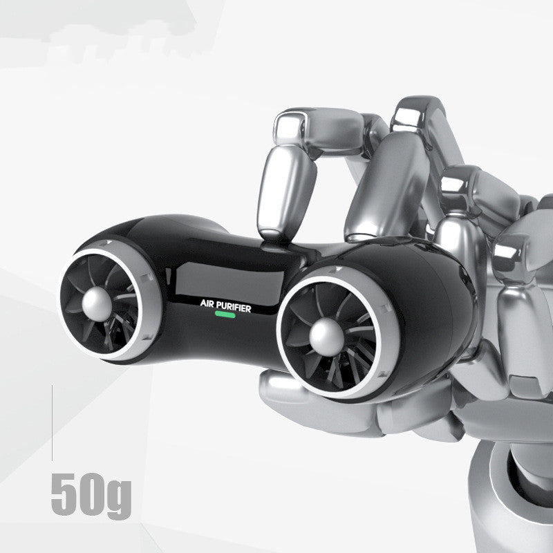 Car Negative Ion Air Purifier in black and white, compact design for car interior, effectively removes dust and odors.