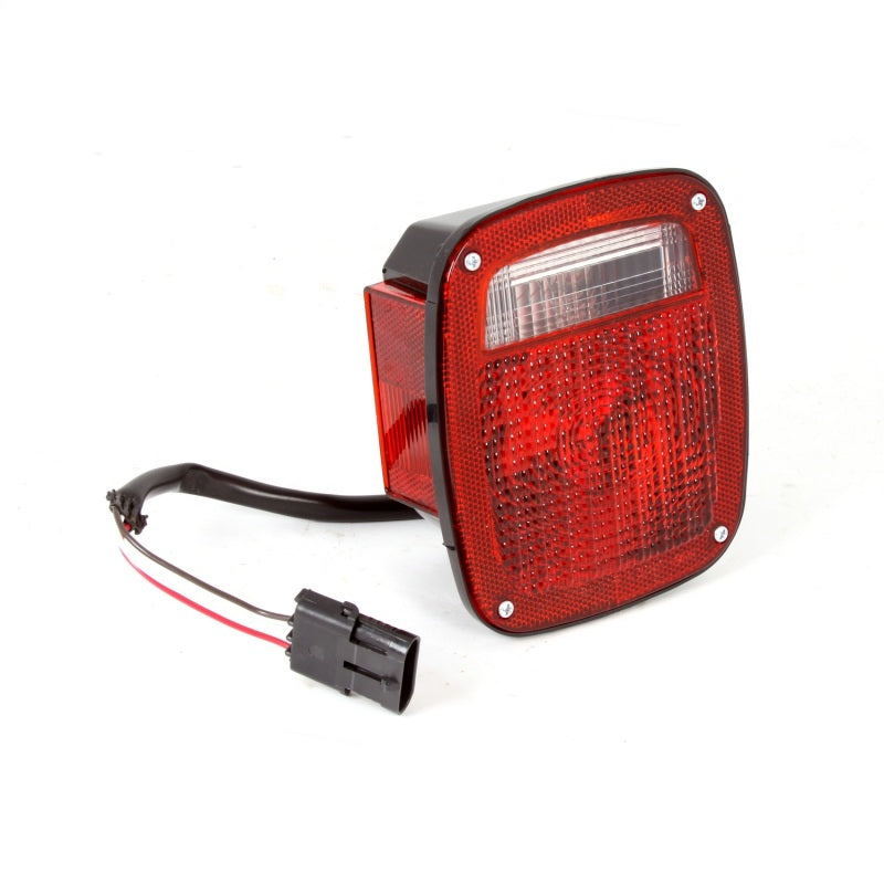 Omix Tail Light LH for 98-06 Jeep Wrangler TJ, showcasing its design and fit for the driver side.