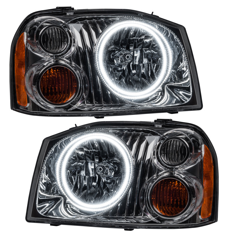 Oracle 01-04 Nissan Frontier SMD headlights with dual halo rings in white, showcasing chrome and black housing options.