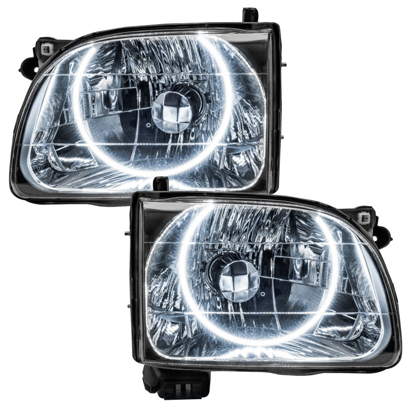 Oracle 01-04 Toyota Tacoma SMD headlights with white halo rings, showcasing chrome and black housing options.