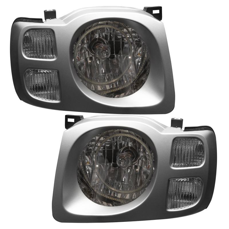 Oracle 02-04 Nissan Xterra SE SMD HL headlights with ColorSHIFT halo rings in Chrome and Black housing.