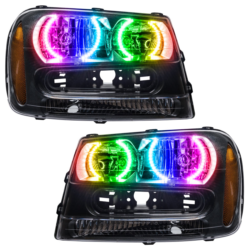Oracle 02-09 Chevrolet Trail Blazer SMD headlights with ColorSHIFT technology, showcasing Chrome and Black housing options.