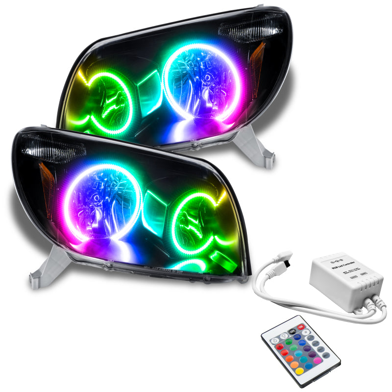 Oracle 03-05 Toyota 4-Runner SMD headlights in black housing with ColorSHIFT halo rings, showcasing a modern and stylish design.