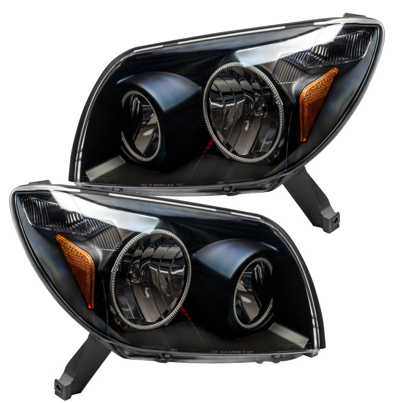 Oracle 03-05 Toyota 4-Runner SMD headlights in black housing with ColorSHIFT halo rings, showcasing a modern and stylish design.