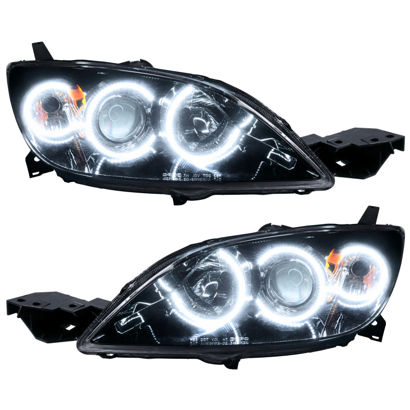 Oracle 04-09 Mazda 3 SMD headlights with white halo rings in chrome and black housing options.