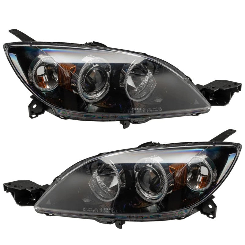 Oracle 04-09 Mazda 3 SMD headlights showcasing halogen style with ColorSHIFT feature, installed on a Mazda 3 hatchback.