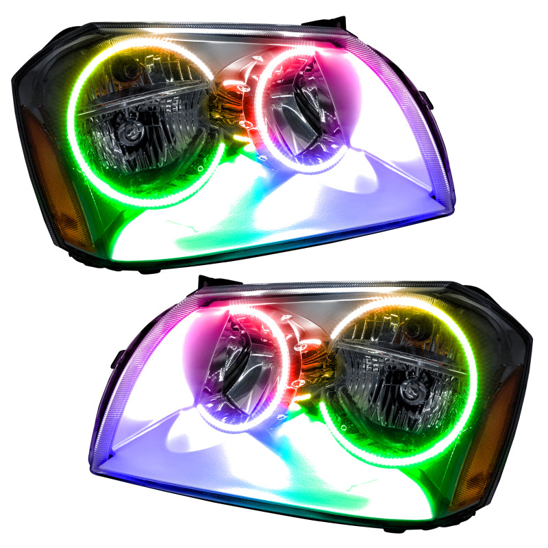Oracle 05-07 Dodge Magnum SMD headlights with chrome housing and ColorSHIFT halo rings, showcasing a modern design for enhanced vehicle lighting.