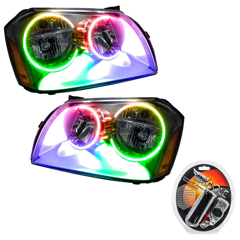 Oracle 05-07 Dodge Magnum SMD Headlights with Chrome ColorSHIFT halos, showcasing a sleek design and bright illumination.