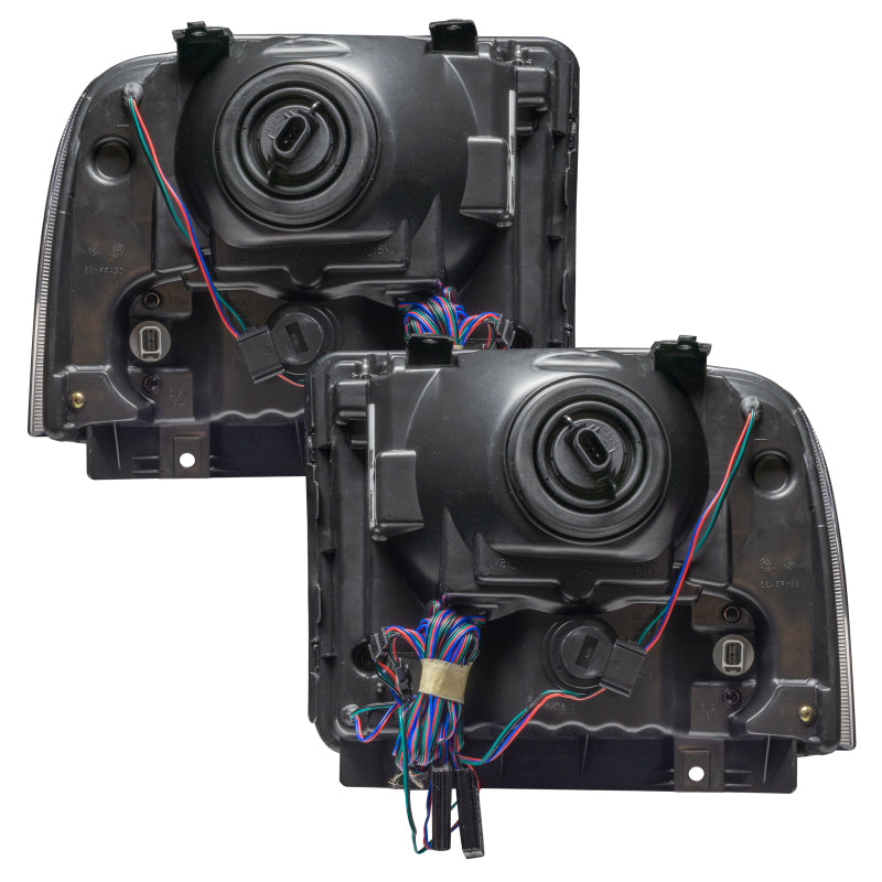 Oracle 05-07 Ford F-250/350 SMD HL headlights in chrome finish with ColorSHIFT technology, showcasing professional halo installation.