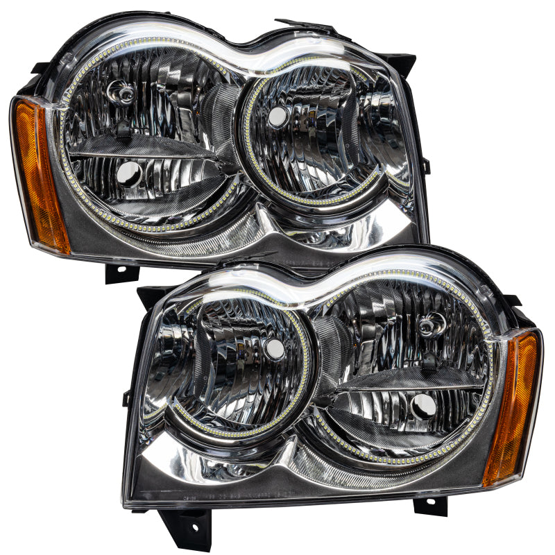 Oracle 05-07 Jeep Grand Cherokee SMD headlights with ColorSHIFT halos, showcasing Chrome and Black housing options.