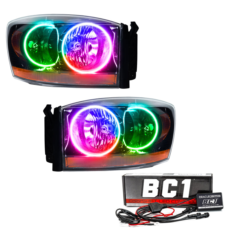 Oracle 06 Dodge Ram SMD HL - Black headlights with ColorSHIFT technology and BC1 Controller, showcasing vibrant LED colors.