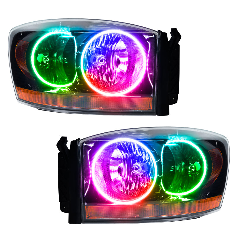 Oracle 06 Dodge Ram SMD Headlights in Black with ColorSHIFT halo rings and simple controller, showcasing modern automotive lighting design.