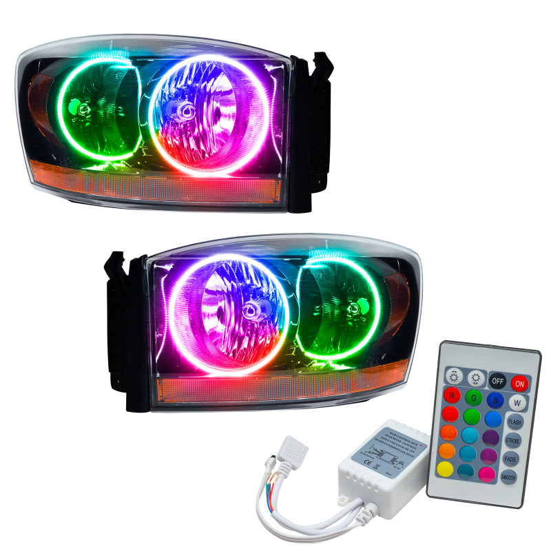 Oracle 06 Dodge Ram SMD Headlights in Black with ColorSHIFT halo rings and simple controller, showcasing modern automotive lighting design.