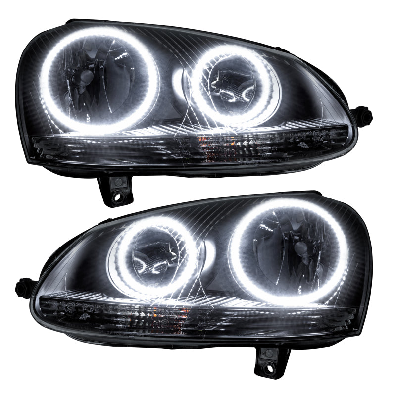 Oracle 06-10 Volkswagen Jetta SMD headlights with chrome housing and white halo rings, showcasing a modern design for enhanced visibility.