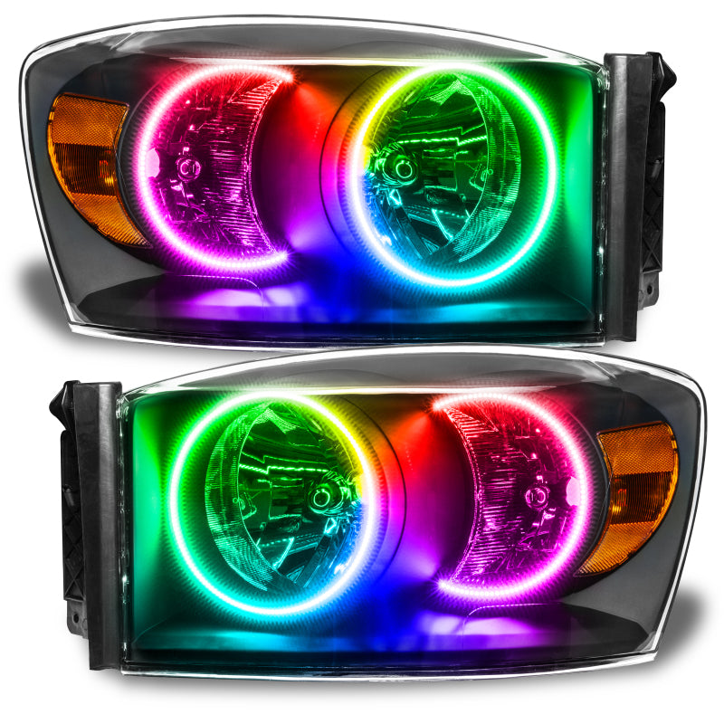 Oracle 07-08 Dodge Ram SMD Headlights in Black with ColorSHIFT technology, showcasing professional halo installation.