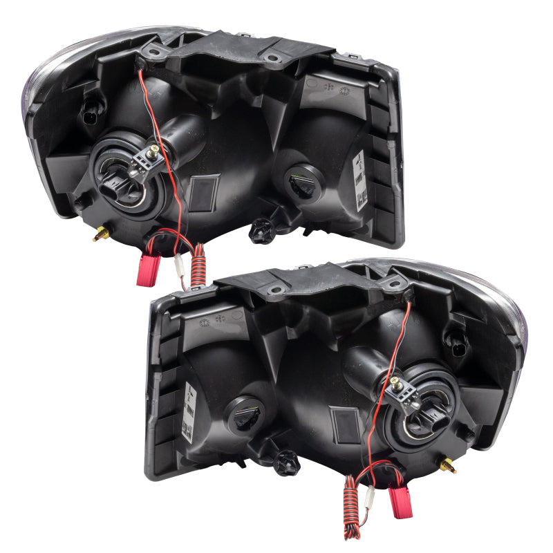 Oracle 07-09 Dodge Durango SMD headlights in chrome with ColorSHIFT technology, showcasing a sleek design and halo rings.