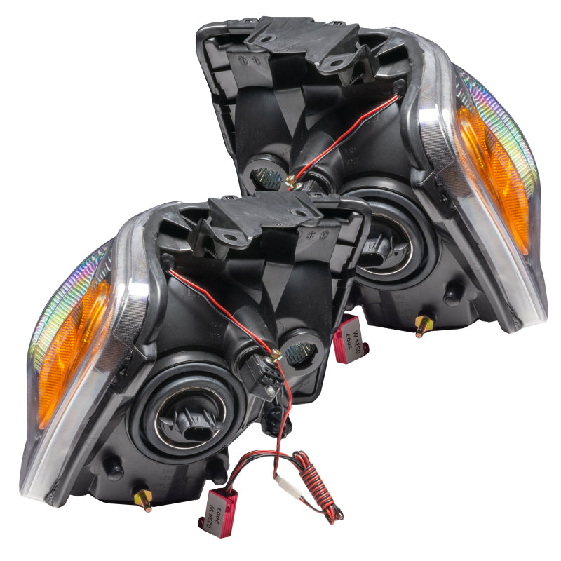 Oracle 07-09 Dodge Durango SMD headlights in chrome with ColorSHIFT technology, showcasing a sleek design and halo rings.