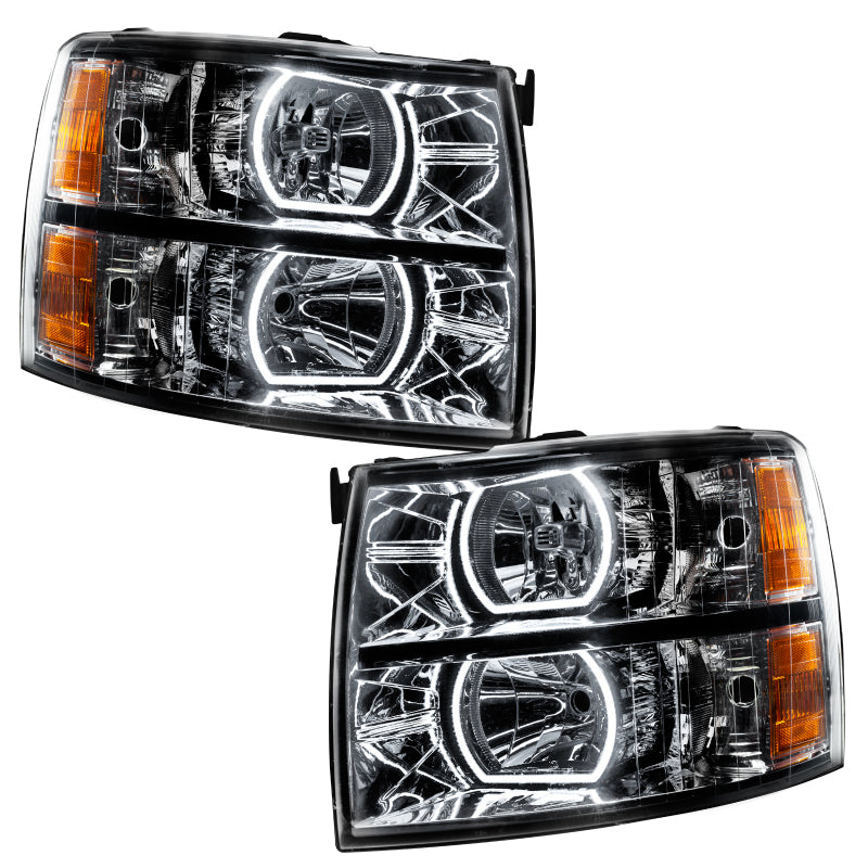Oracle 07-13 Chevrolet Silverado SMD headlights in black with ColorSHIFT technology, showcasing vibrant LED lights.