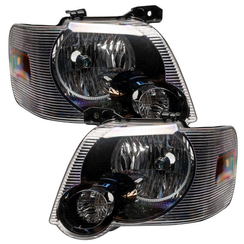 Oracle pre-assembled white headlights for 2008-2010 Ford Explorer Sport Trac with halo rings installed.