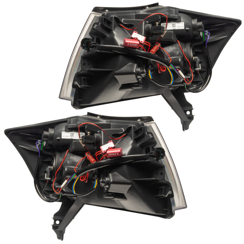 Oracle 08-15 Nissan Armada SMD HL ColorSHIFT headlights with halo rings installed in a sleek black housing.