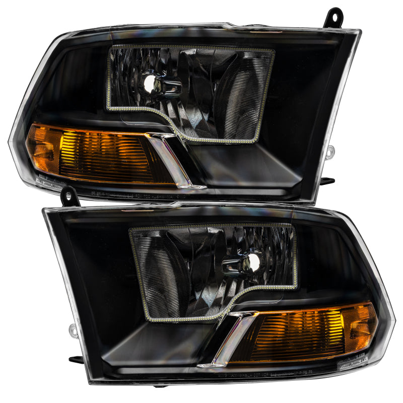 Oracle 09-12 Dodge Ram Non-Sport SMD Headlights in black housing with white halo rings, showcasing a modern design.