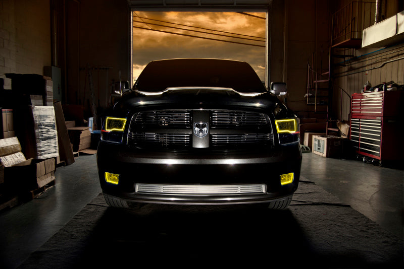 Oracle pre-assembled headlights for RAM 1500 TRX with black housing, showcasing LED technology and sleek design.