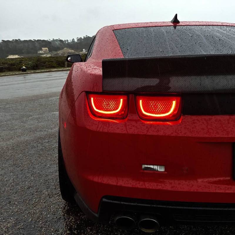 Oracle 10-13 Chevy Camaro LED TL 2.0 tail lights in red, showcasing pre-assembled halo rings for enhanced visibility.
